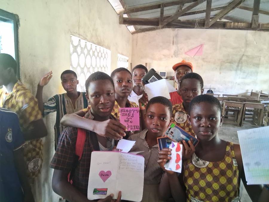 Students share their work in a classroom in Ghana